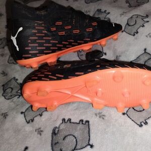 Puma Kids Netfit Future Line Black and Orange Soccer Cleats